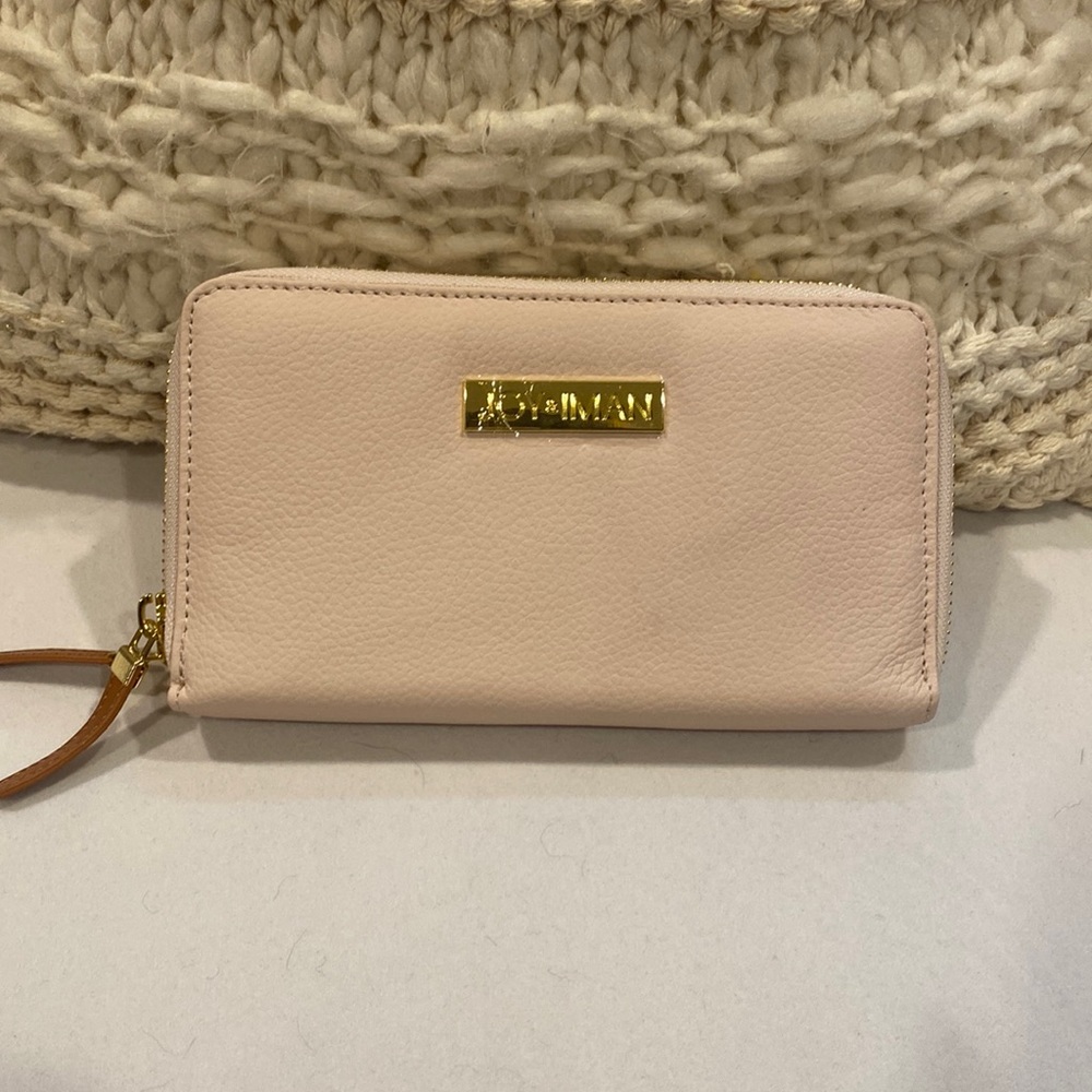 Women’s pink joy, and Iman wallet with brown interior, gold zip accent NWOT